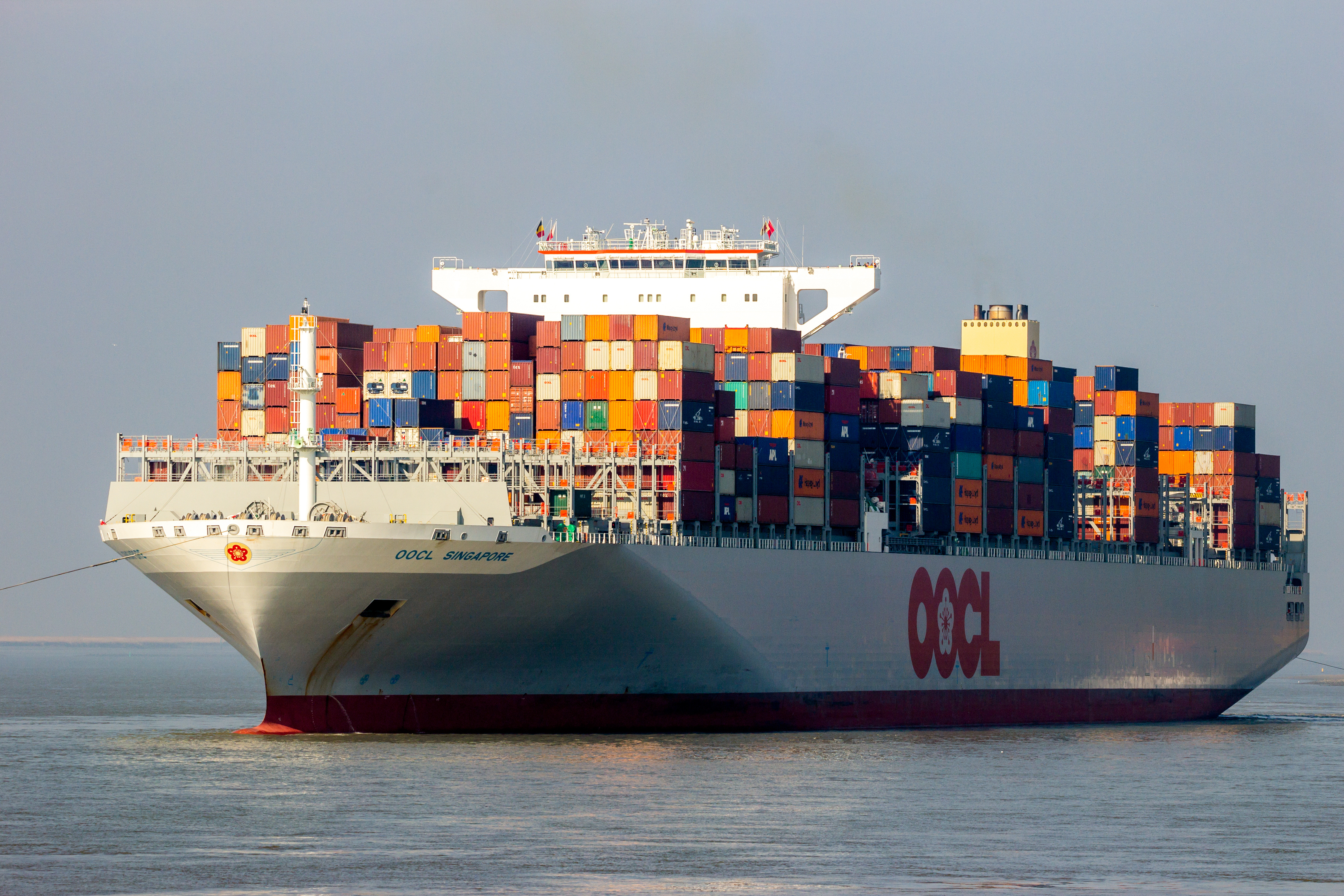 4K OOCL Container Vessel sailing on open sea